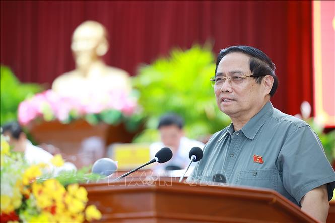 Thủ tướng Phạm Minh Chính phát biểu tại hội nghị tiếp xúc cử tri thành phố Cần Thơ chuyên đề về y tế và giáo dục. Ảnh: Dương Giang-TTXVN 
