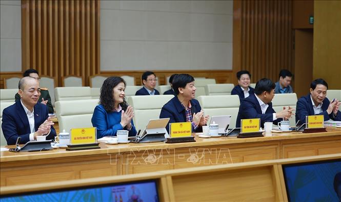 Các địa biểu tham dự Hội nghị sơ kết triển khai xây dựng nhà cho nhân dân bị thiệt hại do bão lũ tại khu vực miền Trung. Ảnh: Dương Giang-TTXVN 
