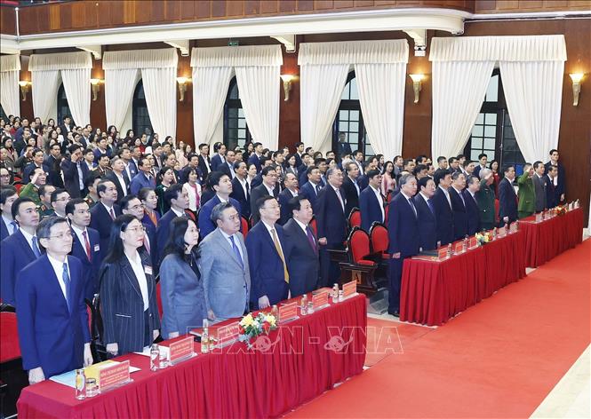 Tổng Bí thư Tô Lâm và các đại biểu thực hiện nghi lễ chào cờ. Ảnh: Thống Nhất – TTXVN