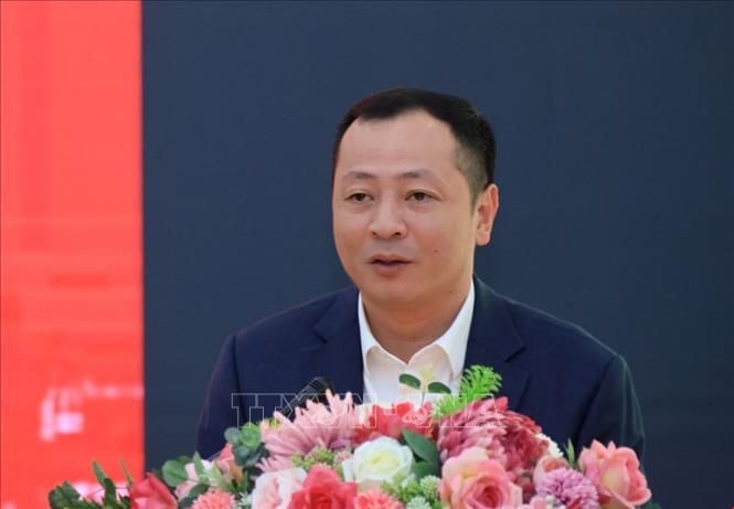 Đại diện Chi bộ Công ty in và Thương mại trình bày tham luận. Ảnh: Tuấn Anh - TTXVN