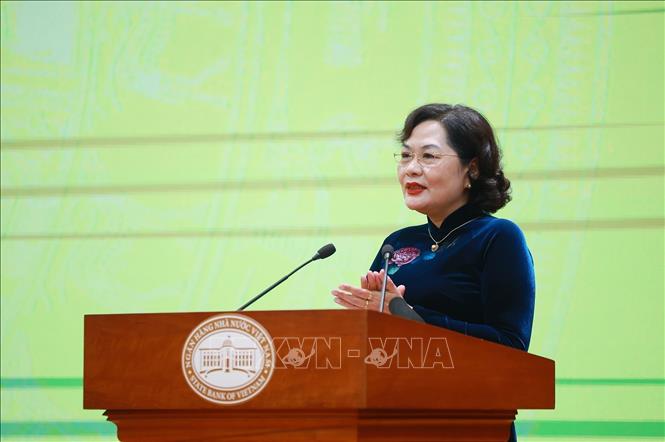 Thống đốc Ngân hàng Nhà nước Việt Nam Nguyễn Thị Hồng trình bày Báo cáo tổng kết năm 2025 và triển khai nhiệm vụ năm 2026 của ngành Ngân hàng. Ảnh: Dương Giang-TTXVN