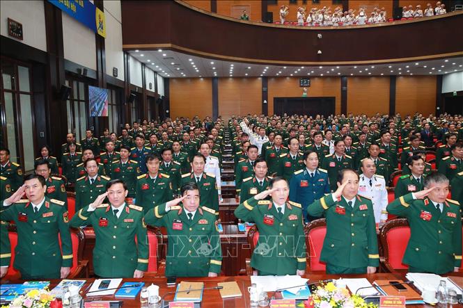 Các đại biểu thực hiện nghi thức chào cờ tại đại hội.  Ảnh: Trọng Đức - TTXVN