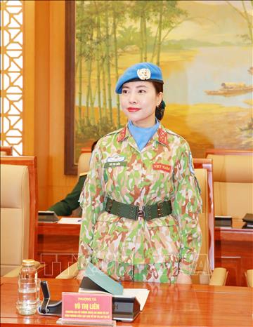 Thượng tá Vũ Thị Liên tại Lễ trao quyết định. Ảnh: Trọng Đức - TTXVN