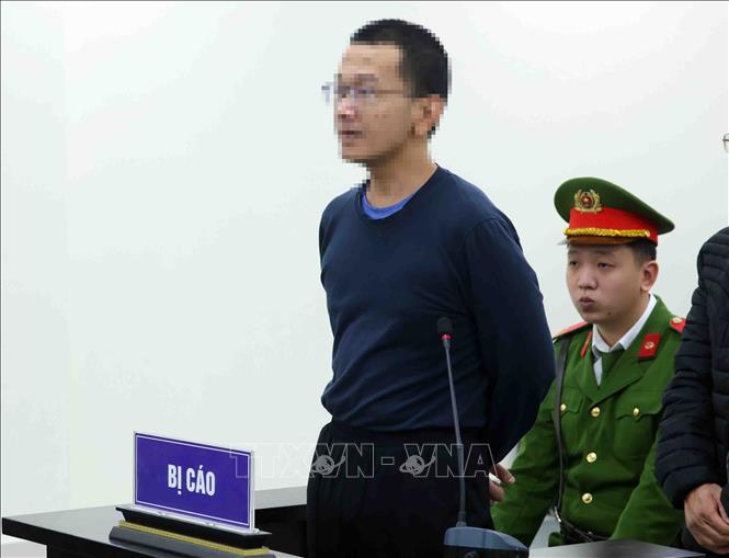 Bị cáo Huỳnh Bảo Đức nhận mức án 6 năm 6 tháng tù về tội “Làm, tàng trữ, phát tán, tuyên truyền thông tin, tài liệu nhằm chống Nhà nước Cộng hòa xã hội chủ nghĩa Việt Nam” theo quy tại Điều 117 - Bộ luật Hình sự. Ảnh: Phạm Kiên - TTXVN
