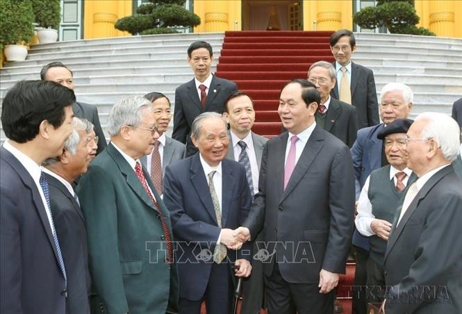 Chủ tịch nước Trần Đại Quang gặp mặt Đoàn đại biểu Ban Liên lạc cựu chuyên gia Việt Nam giúp cách mạng Campuchia Ảnh: Nhan Sáng - TTXVN