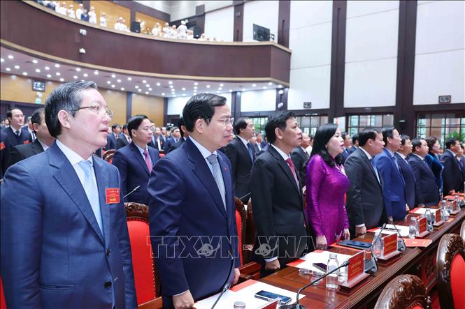 Đại biểu tham dự Lễ kỷ niệm thực hiện nghi thức chào cờ. Ảnh: Phương Hoa - TTXVN