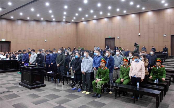 Các bị cáo tại phiên tòa xét xử. Ảnh: Phạm Kiên - TTXVN 
