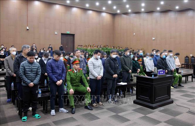 Các bị cáo tại phiên tòa xét xử. Ảnh: Phạm Kiên - TTXVN 