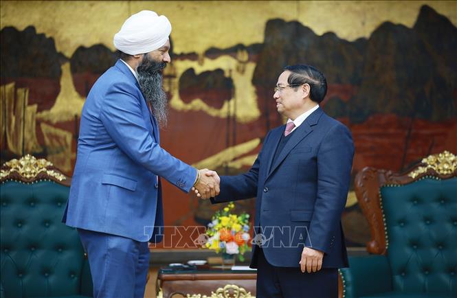 Thủ tướng Phạm Minh Chính tiếp ông Randeep Sarai, Bộ trưởng Phát triển quốc tế, Bộ Các vấn đề toàn cầu Canada. Ảnh: Dương Giang-TTXVN 