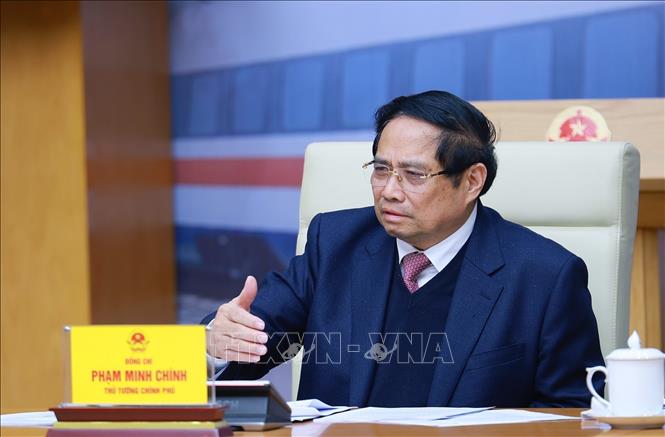 Prime Minister Pham Minh Chinh chairs the meeting. VNA Photo: Dương Giang