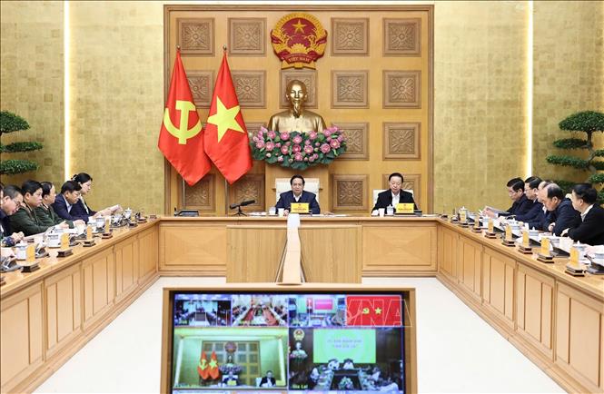 Thủ tướng Phạm Minh Chính chủ trì cuộc họp. Ảnh: Dương Giang-TTXVN