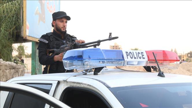 Lực lượng an ninh gác tại Aleppo, Syria. Ảnh: THX/TTXVN