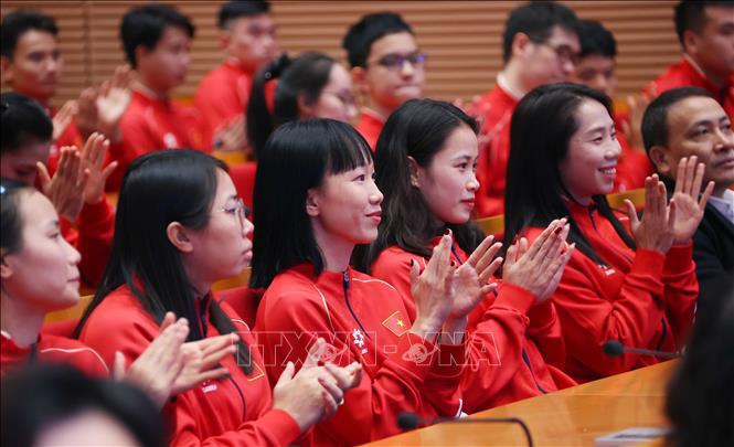 Huấn luyện viên, vận động viên thành phố Hà Nội đạt thành tích xuất sắc tại Đại hội thể thao Đông Nam Á lần thứ 33 dự buổi lễ. Ảnh: Văn Điệp – TTXVN