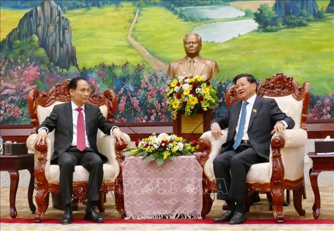 General Secretary of the LPRP Central Committee and President of Laos Thongloun Sisoulith receives the Special Envoy of Party General Secretary To Lam, Minister of Foreign Affairs Le Hoai Trung. VNA Photo: Xuân Tú