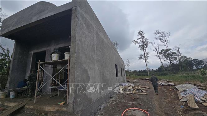 Construction of houses for disaster-affected residents is accelerated. VNA/Photo by courtesy