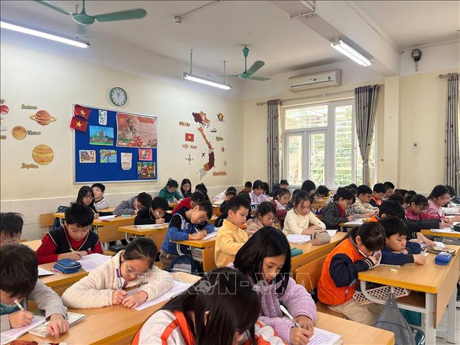 Học sinh Trường Tiểu học Nghĩa Tân (phường Nghĩa Đô, Hà Nội). Ảnh: Nguyễn Cúc-TTXVN