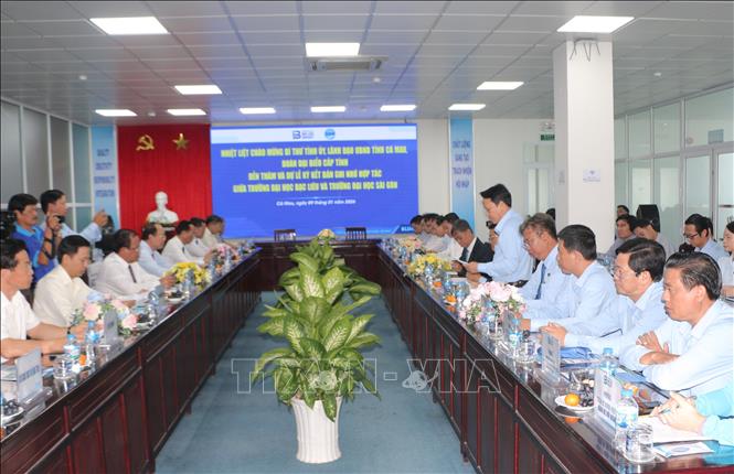 Các đại biểu tham dự lễ ký kết. Ảnh: Tuấn Kiệt - TTXVN