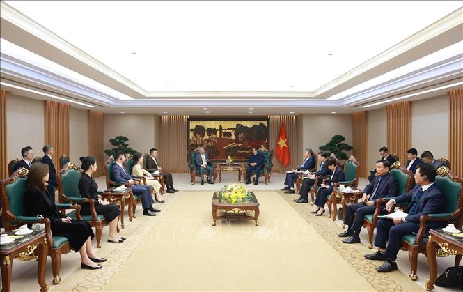 Thủ tướng Phạm Minh Chính tiếp ông Nghiêm Giới Hòa, Người sáng lập Tập đoàn xây dựng Thái Bình Dương (Trung Quốc). Ảnh: Dương Giang-TTXVN