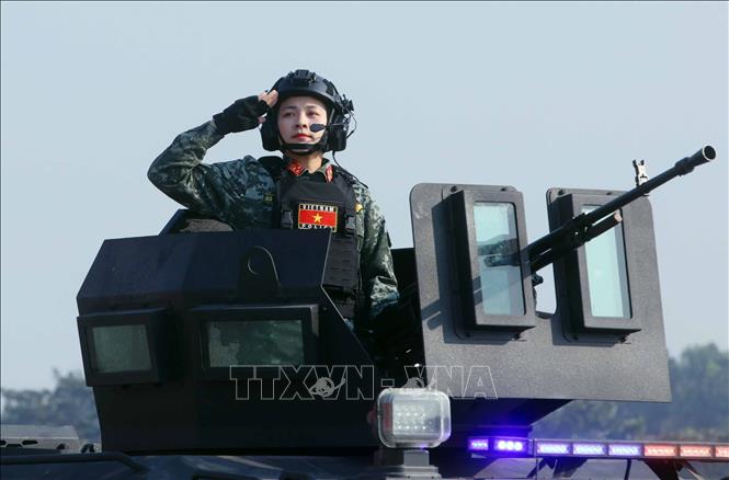 Khối xe tác chiến, chống khủng bố, xe bọc thép chống đạn của lực lượng Cảnh sát đặc nhiệm tham gia diễu hành phương tiện đặc chủng của Bộ Công an tại buổi lễ. Ảnh: Phạm Kiên - TTXVN