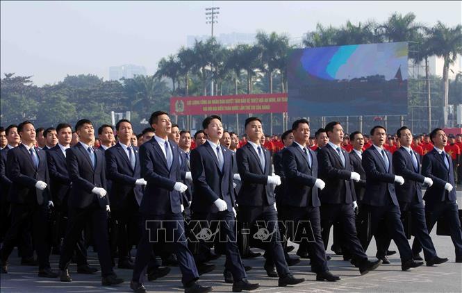 Khối nam sĩ quan Bảo vệ tiếp cận thuộc Bộ Tư lệnh Cảnh vệ tham gia duyệt đội ngũ. Ảnh: Phạm Kiên - TTXVN