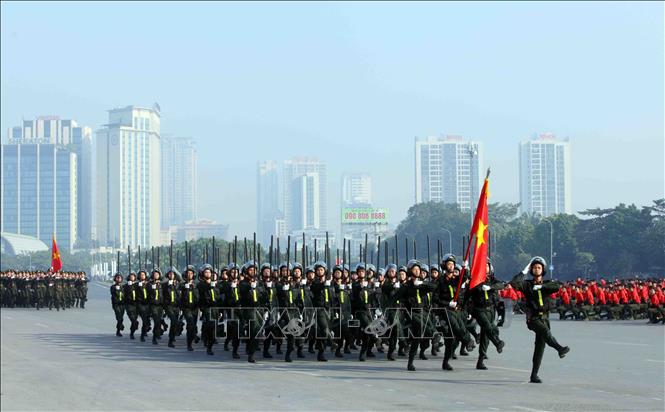 Khối nam Cảnh sát Cơ động tham gia duyệt đội ngũ. Ảnh: Phạm Kiên - TTXVN