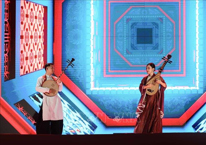 An art performance during the opening ceremony. VNA Photo