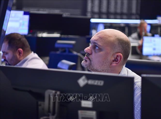 Giao dịch viên tại sàn chứng khoán Frankfurt, Đức. Ảnh: THX/TTXVN