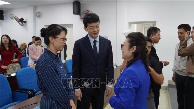 Các doanh nghiệp Việt Nam và Trung Quốc chia sẻ kinh nghiệm tại buổi giao lưu. Ảnh: Khoa Chương - TTXVN