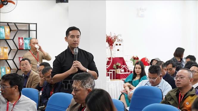 Các doanh nghiệp Việt Nam và Trung Quốc chia sẻ kinh nghiệm tại buổi giao lưu. Ảnh: Khoa Chương - TTXVN