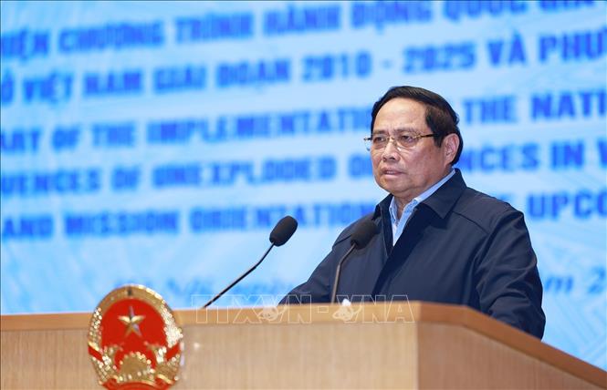 Thủ tướng Phạm Minh Chính phát biểu chỉ đạo Hội nghị tổng kết thực hiện Chương trình hành động quốc gia khắc phục hậu quả bom mìn sau chiến tranh ở Việt Nam. Ảnh: Dương Giang-TTXVN
