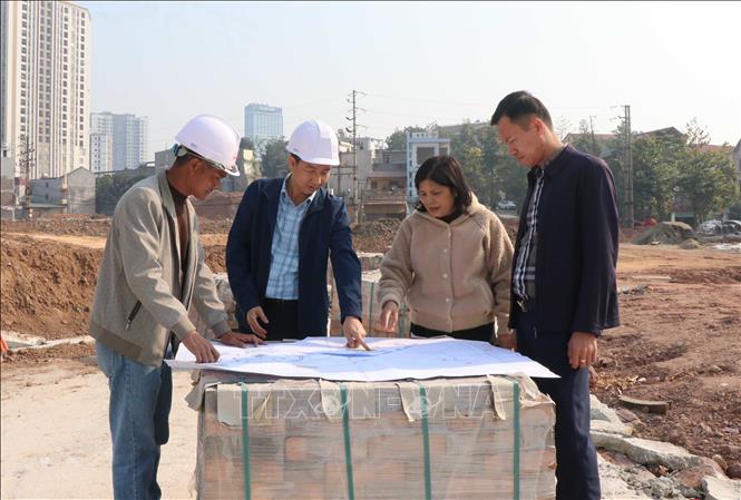 Nhà thầu gấp rút triển khai thi công các hạng mục còn lại của dự án. Ảnh: Thanh Thương - TTXVN