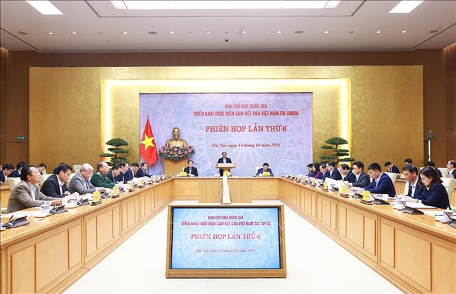Thủ tướng Phạm Minh Chính chủ trì phiên họp lần thứ 6 BCĐ thực hiện cam kết của Việt Nam tại COP 26. Ảnh: Dương Giang-TTXVN 
