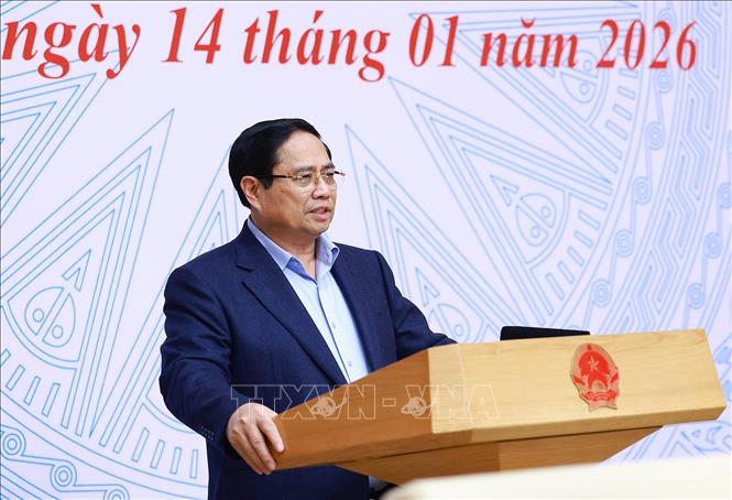 Thủ tướng Phạm Minh Chính chủ trì phiên họp lần thứ 6 BCĐ thực hiện cam kết của Việt Nam tại COP 26. Ảnh: Dương Giang-TTXVN 
