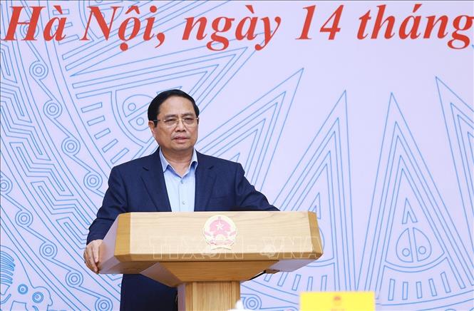 Thủ tướng Phạm Minh Chính chủ trì phiên họp lần thứ 6 BCĐ thực hiện cam kết của Việt Nam tại COP 26. Ảnh: Dương Giang-TTXVN 
