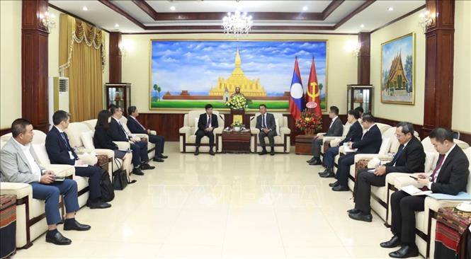 Trưởng Ban Đối ngoại Trung ương Lào Bunleua Phandanouvong tiếp Thứ trưởng Bộ Ngoại giao Nguyễn Mạnh Cường và Đoàn. Ảnh: TTXVN phát