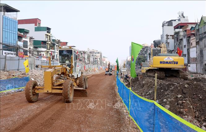 Không khí thi công khẩn trương trên dự án đường Vành đai 1, đoạn Hoàng Cầu - Voi Phục. Ảnh: Quốc Khánh - TTXVN