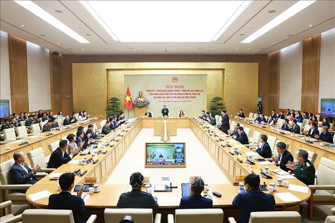 Hội nghị tổng kết “Chiến dịch Quang Trung” xây dựng lại nhà cho các gia đình bị thiệt hại do bão lũ tại miền Trung. Ảnh: Dương Giang-TTXVN 
