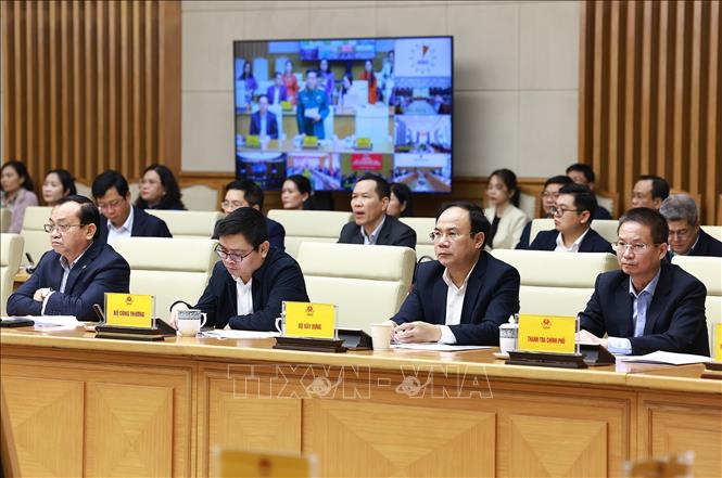 Các đại biểu tham dự Hội nghị tổng kết “Chiến dịch Quang Trung” xây dựng lại nhà cho các gia đình bị thiệt hại do bão lũ tại miền Trung. Ảnh: Dương Giang-TTXVN 