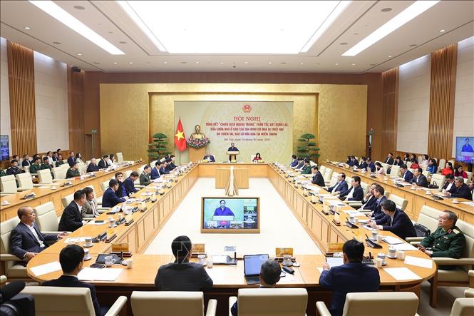 Hội nghị tổng kết “Chiến dịch Quang Trung” xây dựng lại nhà cho các gia đình bị thiệt hại do bão lũ tại miền Trung. Ảnh: Dương Giang-TTXVN 
