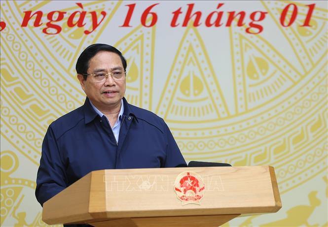 Thủ tướng Phạm Minh Chính phát biểu chỉ đạo Hội nghị tổng kết “Chiến dịch Quang Trung” xây dựng lại nhà cho các gia đình bị thiệt hại do bão lũ tại miền Trung. Ảnh: Dương Giang-TTXVN 
