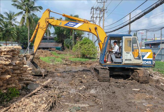 Đoạn Quốc lộ 91 qua phường Thới An Đông đã bàn giao mặt bằng cuối năm 2025 chờ thi công. Ảnh: Thanh Liêm - TTXVN