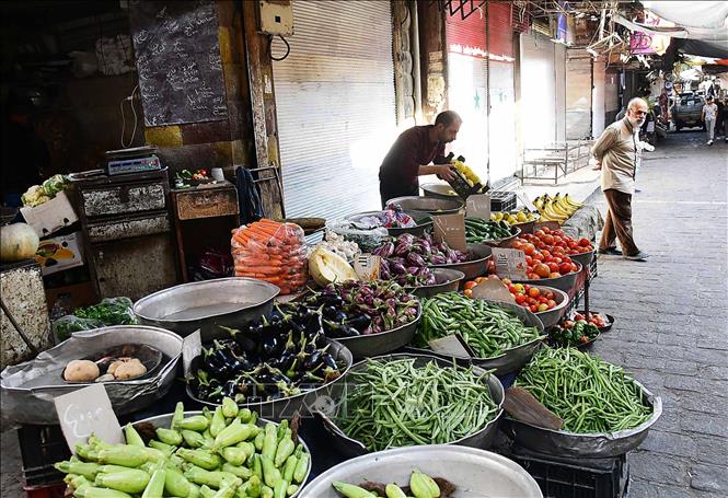 Người dân tại Damascus, Syria. Ảnh: THX/TTXVN