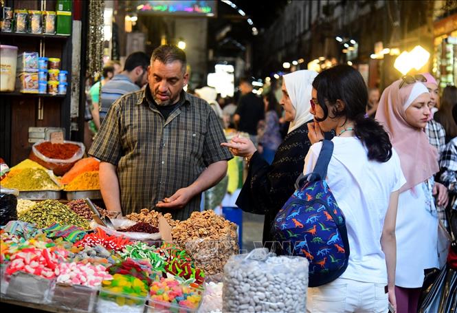 Người dân tại Damascus, Syria. Ảnh: THX/TTXVN