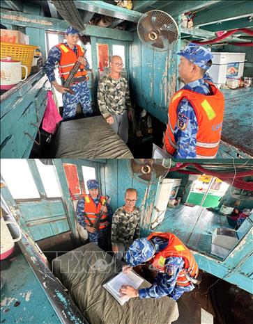 Lực lượng chức năng Bộ Tư lệnh Vùng Cảnh sát biển 4 kiểm tra, lập biên bản tạm giữ phương tiện. Ảnh: TTXVN phát