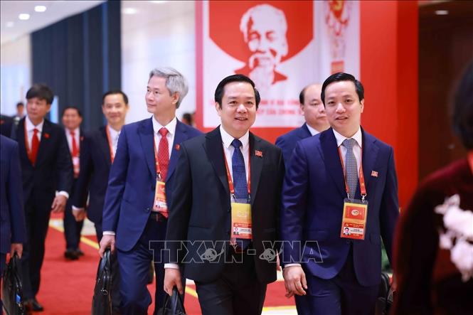 Các đại biểu đến dự phiên họp trù bị Đại hội XIV của Đảng. Ảnh: TTXVN