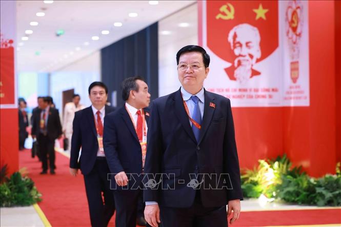 Các đại biểu đến dự phiên họp trù bị Đại hội XIV của Đảng. Ảnh: TTXVN