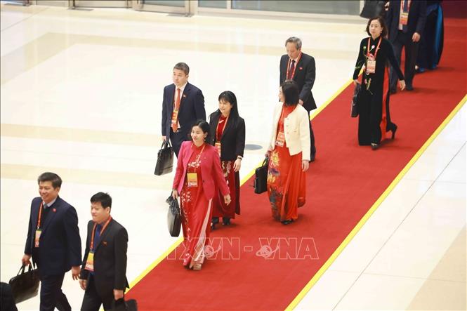 Các đại biểu đến dự phiên họp trù bị Đại hội XIV của Đảng. Ảnh: TTXVN