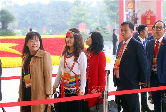 Các đại biểu đến dự phiên họp trù bị Đại hội XIV của Đảng. Ảnh: TTXVN