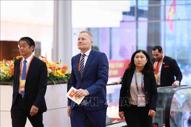 Các đại biểu quốc tế đến dự phiên khai mạc Đại hội XIV của Đảng. Ảnh: TTXVN