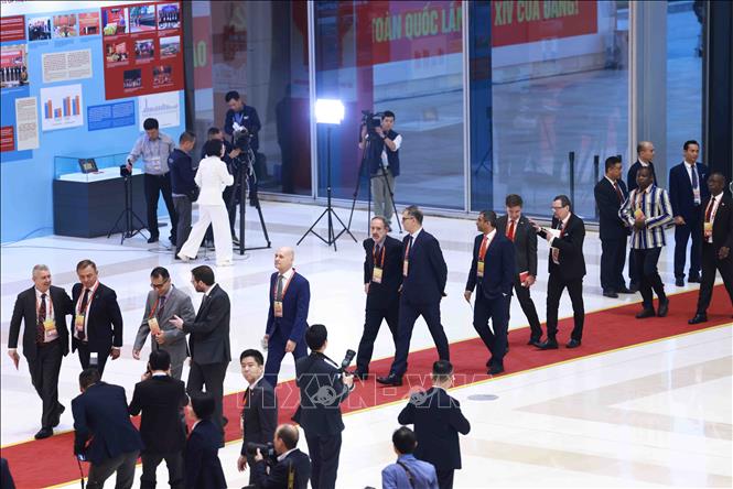 Các đại biểu quốc tế đến dự phiên khai mạc Đại hội XIV của Đảng. Ảnh: TTXVN